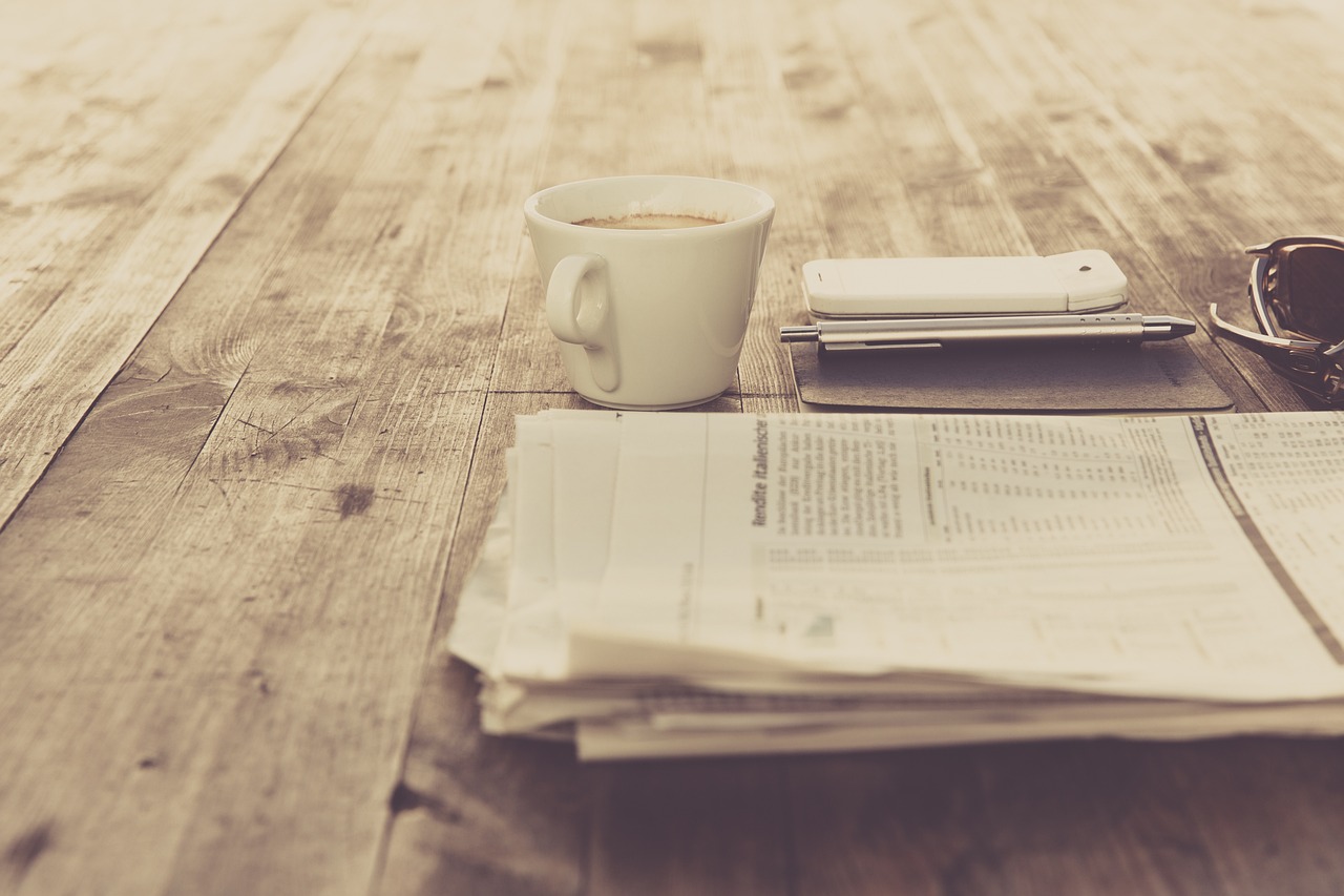 Newspaper and Coffee