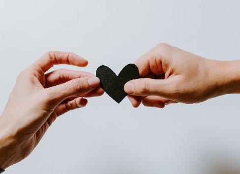 Hands holding a heart