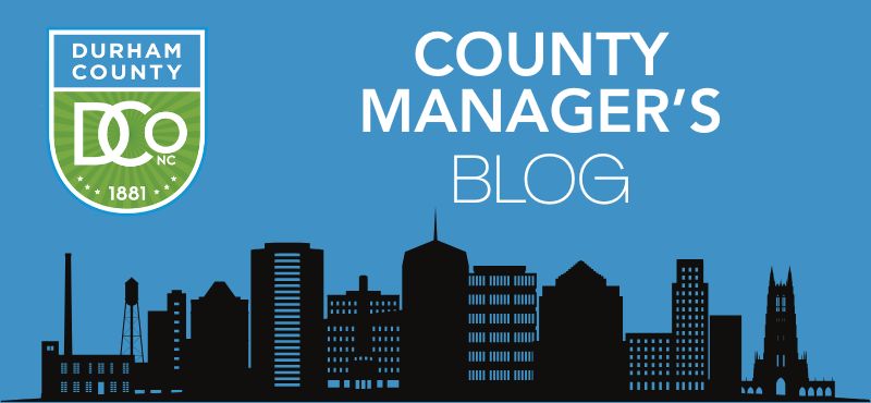 Graphic of Durham skyline illustration with County Manager's Blog in text. Durham County logo on side.