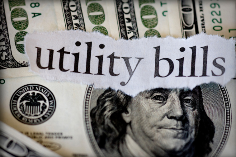 money with utilities written across it