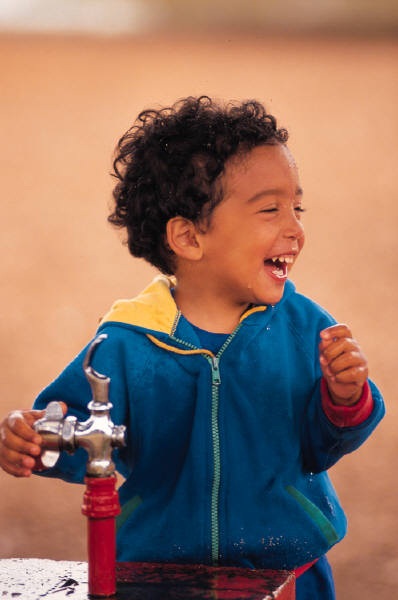 kid at fountain